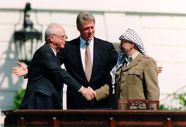 Yitzhak Rabin, Bill Clinton, and Yasser Arafat at the White House 1993.