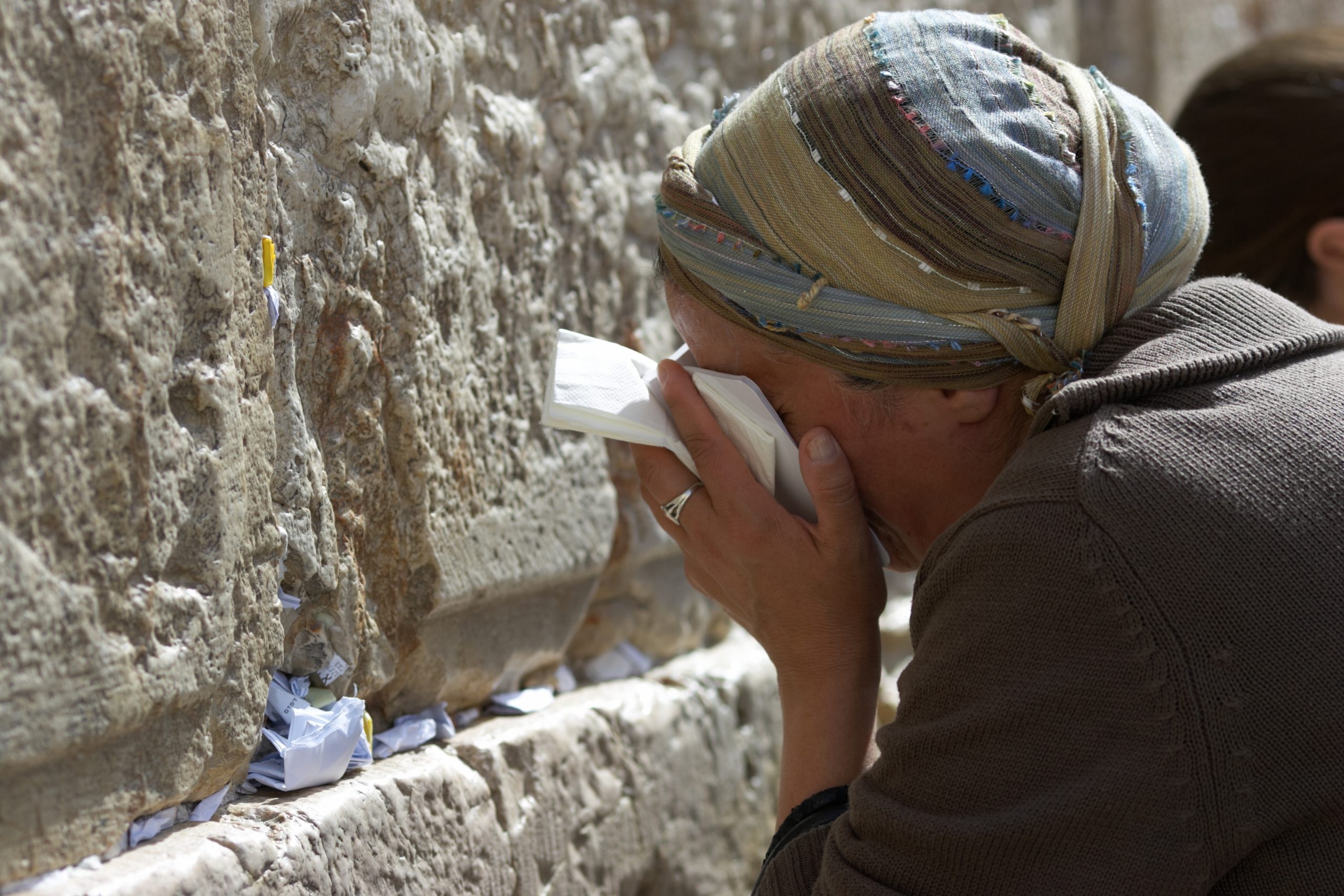 A Jewish woman praying at the Western Wall in Jerusalem